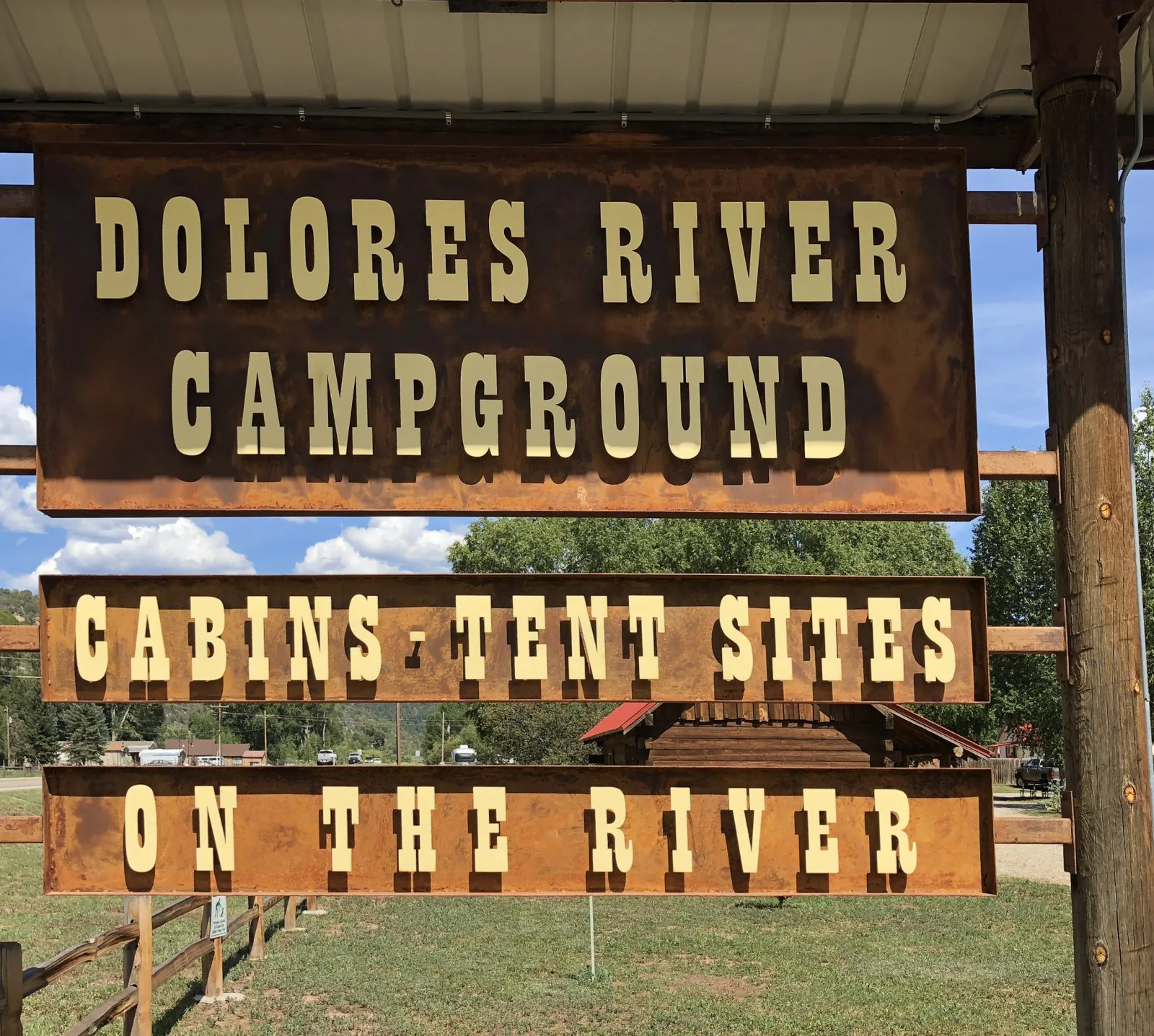 Deloris River Campground sign